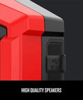 Close-up of red V20 Wireless Bluetooth Speaker with dual 3-inch stereo drivers, showing power and auxiliary input ports.
