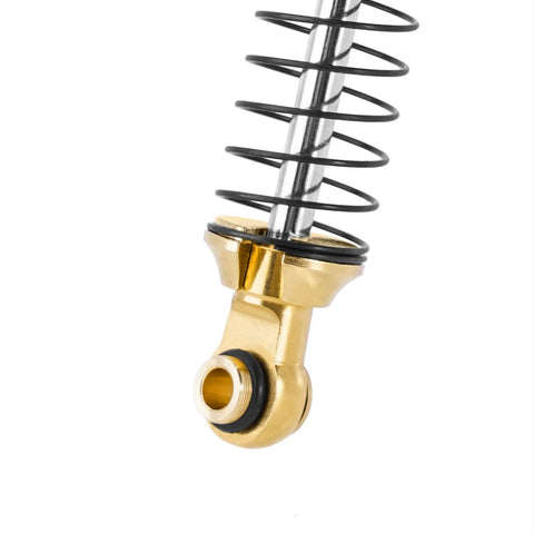 Close-up of Beefed Up Brass And Aluminum 59mm Long Threaded Oil Shock for TRX4M RC Car, showing brass bottom rod end and spring.