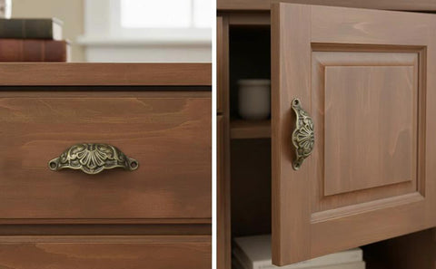 Set Of 10 Cup Pull Handles Shell Shape With Mounting Screws for cabinets and dressers in antique brass zinc alloy, installed view.