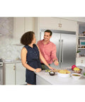 Sleek Smudge Proof Stainless Steel Upright Freezer With 18.9 Cubic Feet Storage And Smooth Glide Out Ice Maker in modern kitchen.