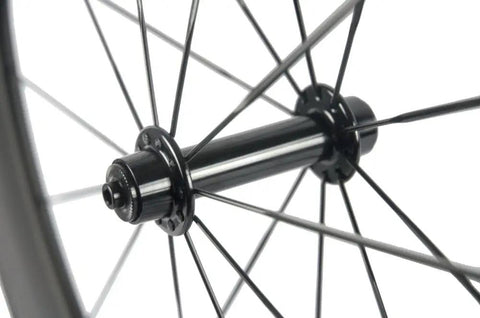 Hub detail of Race Ready Carbon Road Wheelset 88mm Deep Clincher 700c With 23mm Width Fits Shimano Cassettes Matte 3K Finish