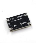 Ultra Compact 5V Buck Converter Board From 5-28V Input To 5V Output Up To 1.8A, Tiny But Mighty DC-DC Regulator Module With Low Ripple Under 30mV, 1.5 MHz Switching, Plug And Play Black Board For DIY Projects showing input and output ports