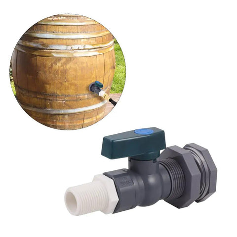 Three Quarter Inch PVC Rain Barrel Spigot Kit With Garden Hose Adapter and bulkhead fitting installed on wooden barrel