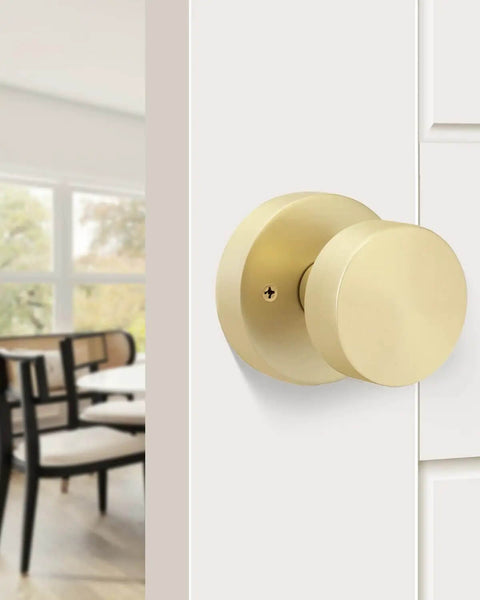 Gold Dummy Door Knobs Set Four Pack Heavy Duty Zinc Alloy With Brushed Gold Finish installed on a white interior door.