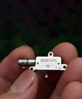 Mini 5mm Stroke Linear Actuator 2 Phase 4 Wire Stepper Motor With Precision Metal Gearbox held in hand, showcasing compact design.