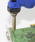N61-10 Desoldering Nozzle 1.6mm Quick Change Tip for FR Series in use on a green circuit board, silver finish