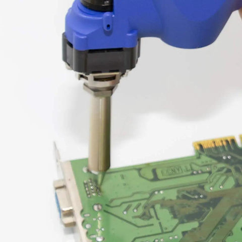 N61-10 Desoldering Nozzle 1.6mm Quick Change Tip for FR Series in use on a green circuit board, silver finish