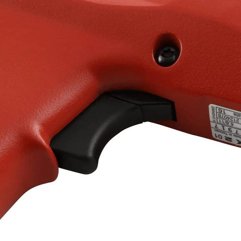 Close-up of trigger on Powder Actuated Fastening Tool For Drywall Tracks And Concrete Pro Grade Compact Fastener Gun