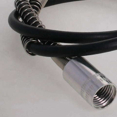 Close-up of Flexible Shaft Attachment For Rotary Tools 39 Inch Long, 4mm Tube, 18mm Connector, 2mm Pitch, coiled metal detail.
