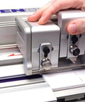 Close-up of Evolution3 BenchTop Material Cutter with Graphik tool head in use, showcasing 260 cm cutting length precision.