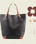 DIY Bag Corner Repair Kit For Purses And Leather Bags With Corner Patches Cone Needle Thread And Finger Cots Quick Fix Tools For Easy Home Leather Sewing And Craft Projects shown with a black leather bag, brown handle, and four cowhide corner patches.