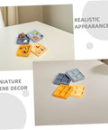 Four Grid Dollhouse Storage Box Resin Organizer For Candy, Nuts, And Sweet Tiny Treats displayed on a white table