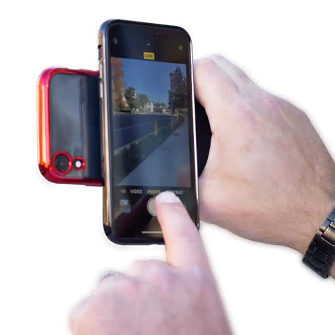 Universal Dual Phone Carrier With Strong Magnetic Mounts For Smart Device Storage. Dual holder securing two smartphones in use.
