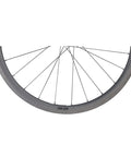 Close-up of Thirty Eight Millimeter Carbon Clincher Road Bike Wheelset Tubeless Ready Rim Brake With Sapim CX Ray Spokes Beefy Aero Profile