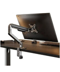 Fully Adjustable Single Monitor Mount For Desk Featuring Mechanical Spring Arm With Super Smooth Tilt and Rock Solid Bracket Design Supporting 17 To 32 Inch Screens Up To Twenty Pounds Easy Install, mounted on a desk.