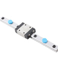 100mm linear rail guide with sliding block; miniature precision rail, silver rail, black carriage, two blue caps