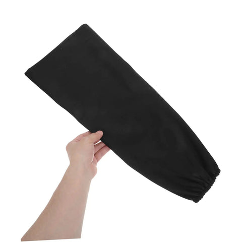 Legit Flame Resistant Welding Sleeves And Built Different Cotton Arm Guards offering heavy duty heat protection, black cotton sleeve in hand.