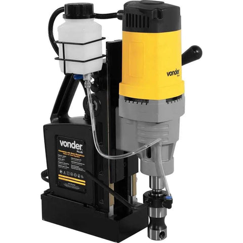 Heavy Duty Magnetic Base Drill Press Rock Solid Shop Workhorse Two Twenty Volt Portable Core Boring Rig For Tough Metal Jobs No Fuss Setup Sweet Performance Day In Day Out with yellow motor and coolant tank.