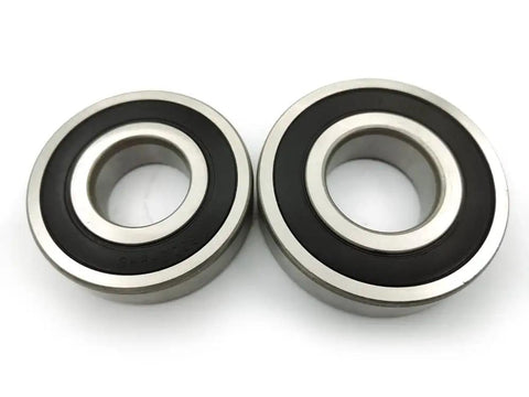 Premium Heavy Duty Washer Tub Bearings And Seal Kit Replacement For Top Load Washers Smooth Spin Fix Easily Swaps Out 131525500 131275200 131462800 AP2578105 407639 AH418071 PS418071 showing two metal bearings with rubber seals.