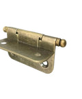 Close-up of a Hidden Barrel Cabinet Hinge Classic Brass, showcasing its durable and smooth swing design.