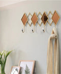 Real Deal Nordic Wrought Iron Wall Hooks For Coats And Keys Heavy Duty Build That Handles Your Daily Carry Without A Single Hassle Or Snag On Jackets, modern wall hook set with diamond mirrors and 3 hooks.