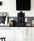 Smooth Operator Automatic Bean To Cup Coffee Maker Featuring A Slick Color Touch Display And Hassle Free Self Cleaning Cycle For Pro Level Continuous Brewing At Office Or Home on a modern kitchen counter.