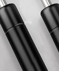 Close-up of Beefy 2 Pack 10 Inch Gas Prop Shocks 100N 22LB Black Gas Springs showing metal and black design.
