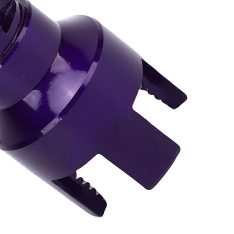 Close-up of the purple metal part of the Half Inch Pipe Threading Tool With Precision Clean Cut Threader And Screw Extractor Set.