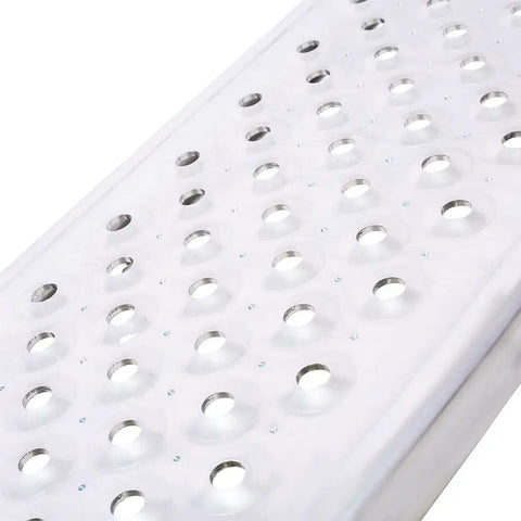 Textured surface detail of 2 Pack Aluminum Loading Ramps For Shed Use 4 Ft Long By 8.6 Inch Wide Heavy Duty 880 Lb Capacity Lightweight Anti Slip