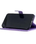 Purple phone stand case holding a smartphone horizontally