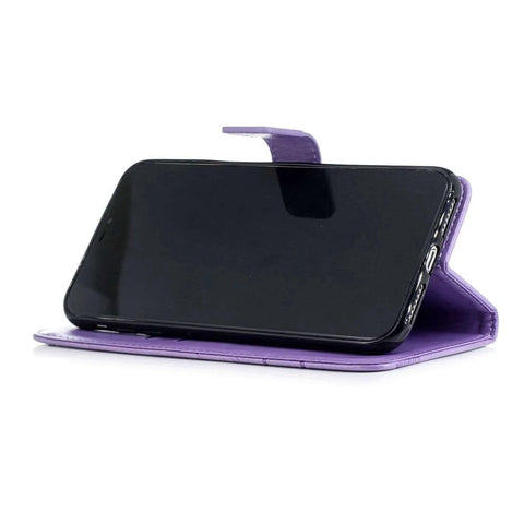 Purple phone stand case holding a smartphone horizontally