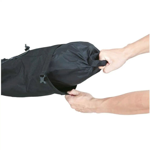 Hands holding BackLoader 15L Bikepacking Seat Bag With Water Repellent Durable Polyethylene And Nylon Construction For Stable Ride