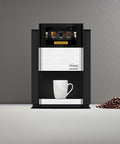 Creation 600 Single Serve Brewer for coffee, lattes, tea with in-cup frothing, shown in black with coffee cup and beans.