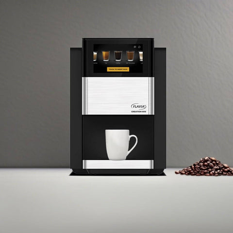 Creation 600 Single Serve Brewer for coffee, lattes, tea with in-cup frothing, shown in black with coffee cup and beans.