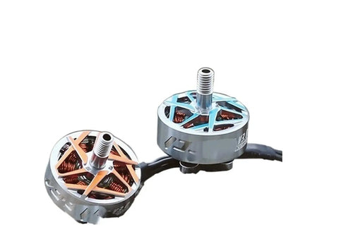 Close-up of two 3Rd Gen Pacer P2207 V3 Brushless FPV Racing Drone with 5 Inch Prop Explosion Proof Motors KV2550 in aluminum housing.