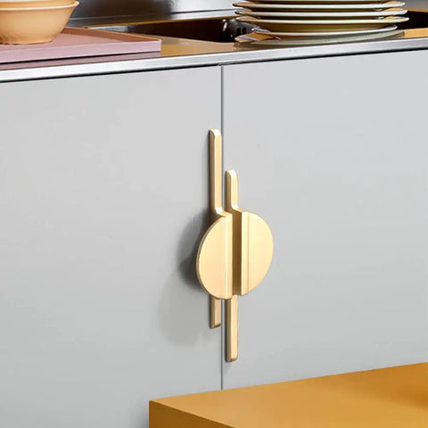 Brushed Gold Half Moon Cabinet Pulls 64mm Center to Center, 7.5 Inch Overall Length installed on gray kitchen cupboard