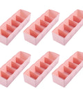 Six Piece Pink Plastic Underwear Drawer Organizer Set Smooth Dresser Storage Dividers arranged for tidy sock organization.
