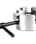 Close-up of Three Inch 4 Jaw Lathe Chuck With Independent Reversible Jaws K72-80 Manual Turning Machine Accessory for metal projects.