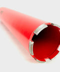 Side view of red 3-inch diamond wet core drill bit with 1-1/4 inch threaded shank for concrete and masonry