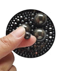 Premium Silicon Nitride Ceramic Ball Bearings Built Tough For Extreme Heat And Heavy Loads At Sixty Three Point Five Millimeters shown in hand.