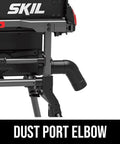 Solid 15 Amp 10 Inch Table Saw Featuring Kickass Precision Cuts And Rack And Pinion Fence Rails For Dead On Accuracy Plus Foldaway Legs For Total Ease And No Sweat Storage On Any Job Site, showing dust port elbow attachment.