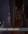 Child walking in hallway illuminated by 4 Pack Illuminated Light Switches No Neutral Wire Easy Install Single Pole Paddle Rocker With Night Light 15 Amp 120 Or 277 Volt Glossy White Great For Bedrooms Hallways And Night Time Safety And Convenience, providing nighttime safety.