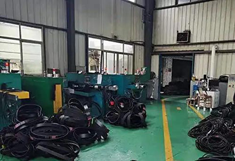 Factory interior with 46-250 Drive Belts for Lathe Type 1 Type 2 Replacement Parts Two Pack, ready to install, stacked on the floor.