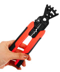 Badass Heavy Duty Wire Stripper And Crimper Pliers With Slick Bending Jaw Pro Grade Electrician Gear held in hand, featuring red grips.