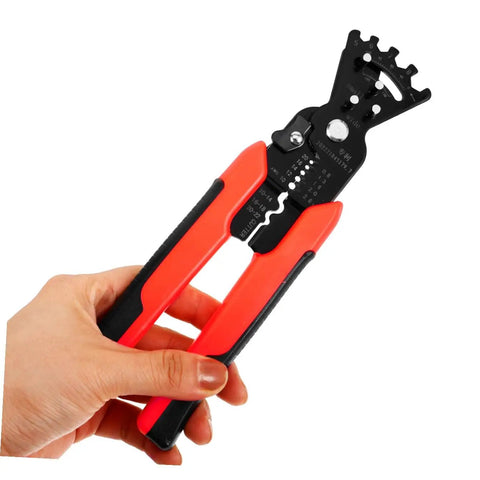Badass Heavy Duty Wire Stripper And Crimper Pliers With Slick Bending Jaw Pro Grade Electrician Gear held in hand, featuring red grips.