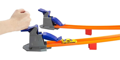 Super Speed Blastway Dual-Track Race Set With 1 64-Scale Car with side-by-side launchers and yellow toy car ready to race.