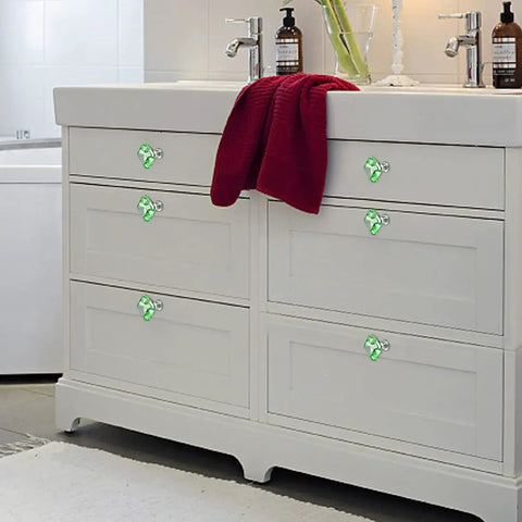 Straight Fire Diy Resin Cabinet Knob Mold Kit For Making Custom Epoxy Drawer Pulls With Polygonal Styles Plus Twenty Four Bases And Thirty Millimeter Screws Gonna Elevate Your Workspace on a white bathroom cabinet with green knobs.