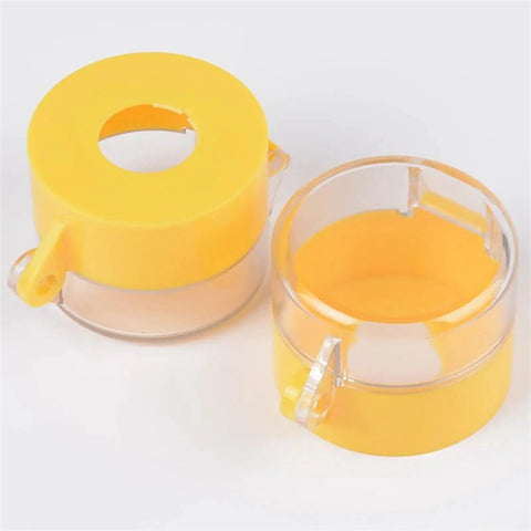 Must Have Five Pack Emergency Stop Button Protective Covers For 22mm Mushroom Head Switches Yellow Prevent Misoperation And Quick Halting Of Machinery In Industrial Environments. Two yellow covers with clear bases.