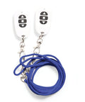Two remote controls with black buttons attached to blue rope leashes on a white background