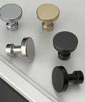 Assorted cabinet knobs including Matte Black Cabinet Knobs Set 10 Pack Round Single Hole Drawer Pulls For Kitchen Bathroom.